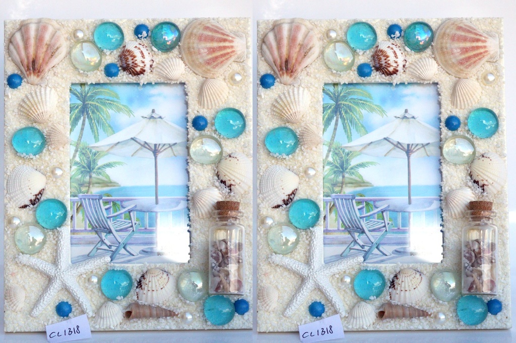 OKVIR ZA SLIKU OD ŠKOLJKI  S BOČICOM CM 15*19 CM 