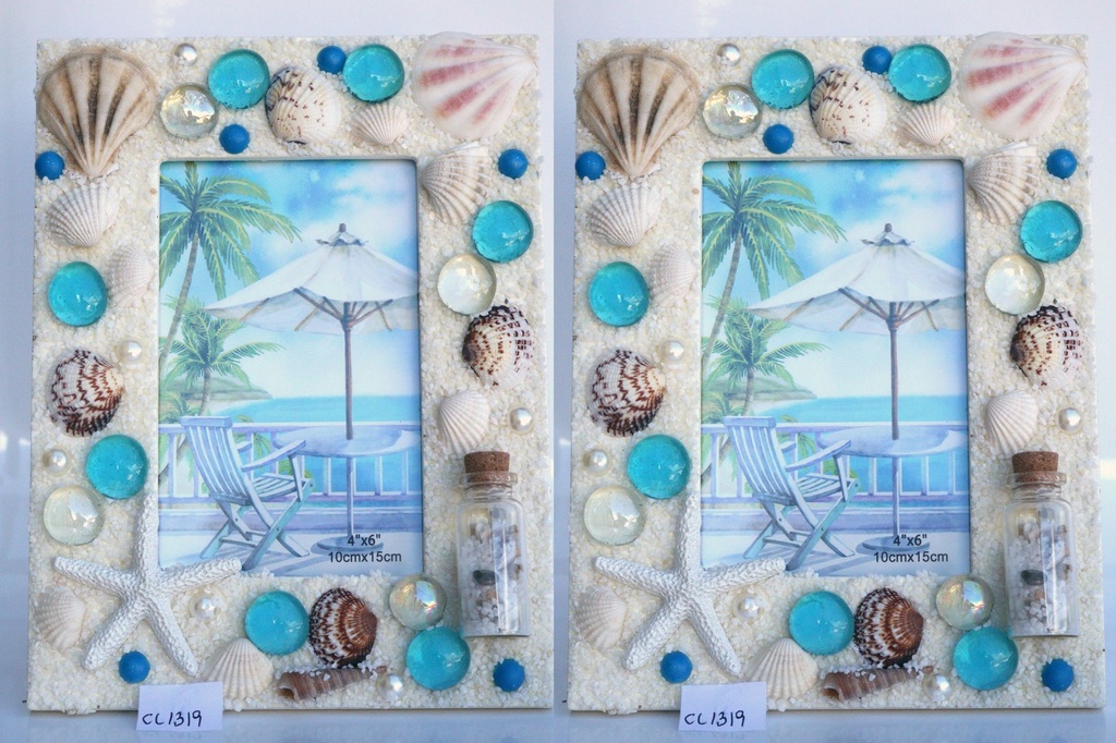 OKVIR ZA SLIKU OD ŠKOLJKI  S BOČICOM CM 16*22 CM 