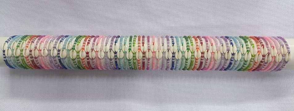 BRACCIALE PERLINE E CONCHIGLIA SU TUBO