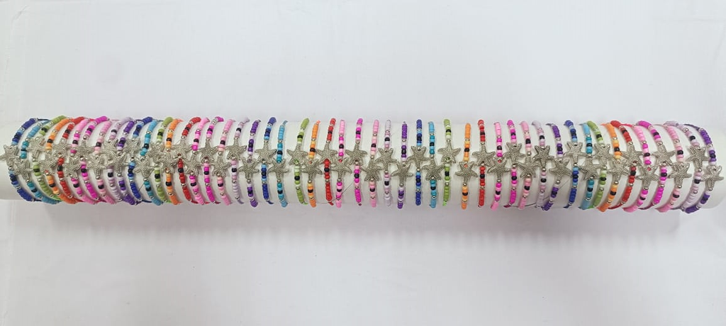 BRACCIALE PERLINE E METALLO SU TUBO