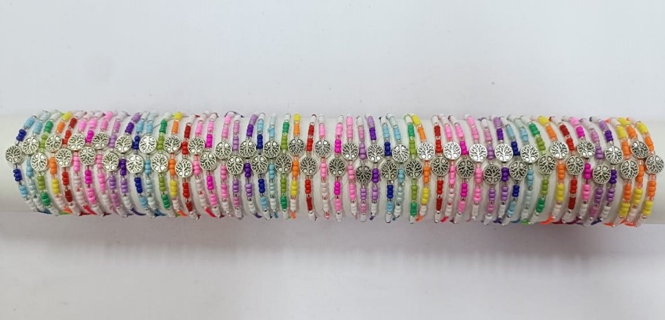 BRACCIALE PERLINE E METALLO SU TUBO